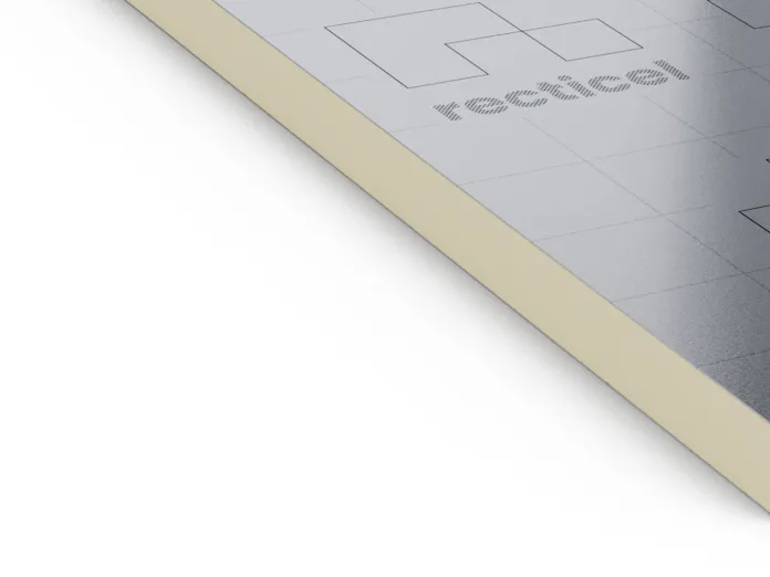 Reflective metallic sheet with embossed text and grid design.