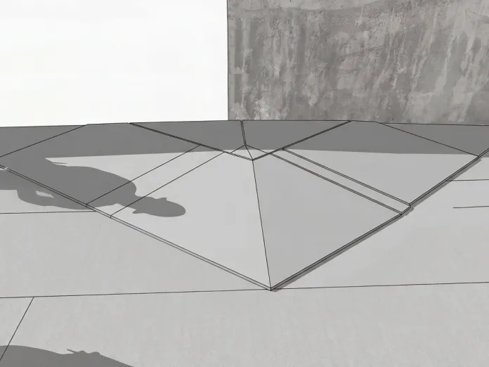 Geometric shadow on grey tiled pavement.
