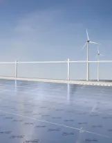 Plat dak geisoleerd met Recticel en windmolens