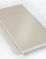 Rectangular beige foam board on a white background.