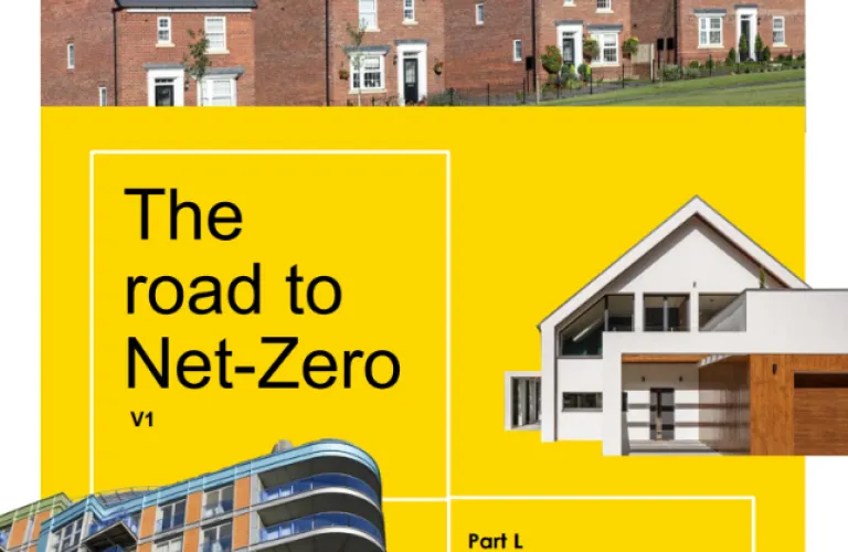 Brick houses and modern buildings on a magazine cover about Net-Zero.