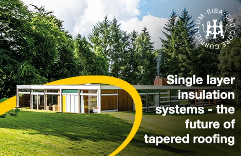 Modern house with large windows surrounded by trees and grass. Logo in the corner.