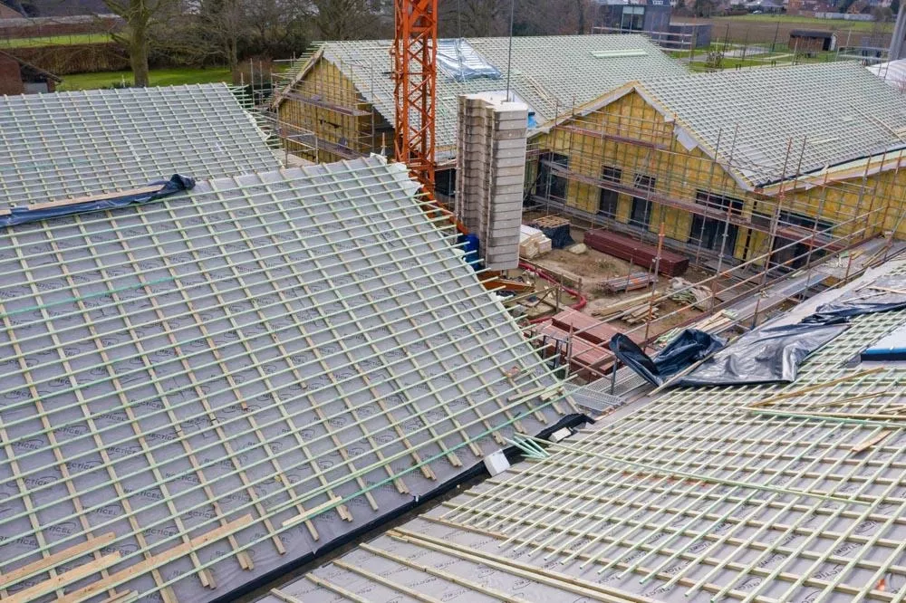 Nouveau projet de construction Ubuntu à Avelgem isolé avec isolation de toiture inclinée Powerroof Max