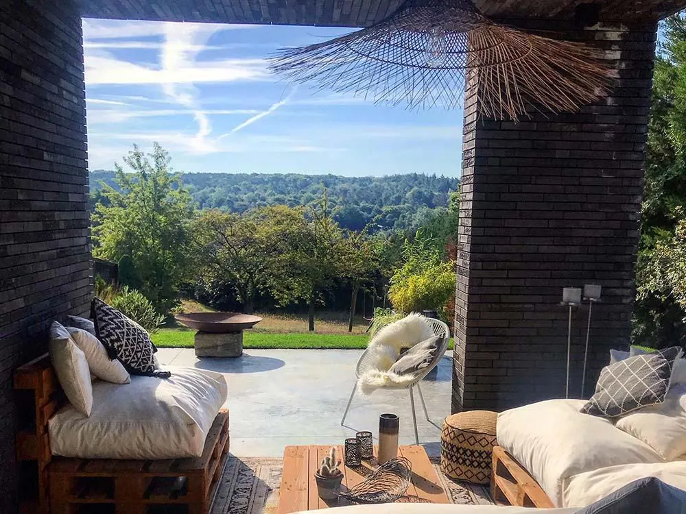 Energiezuinige renovatie te loonbeek met Recticel spouwmuur- en plat dak isolatie achtergevel