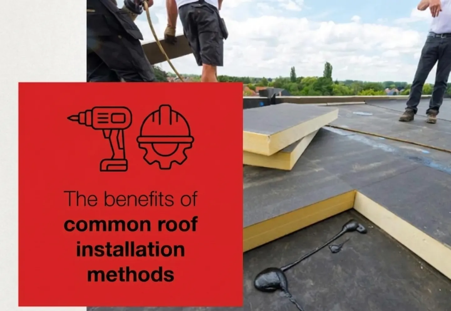 Roofers installing insulation panels on a flat roof.