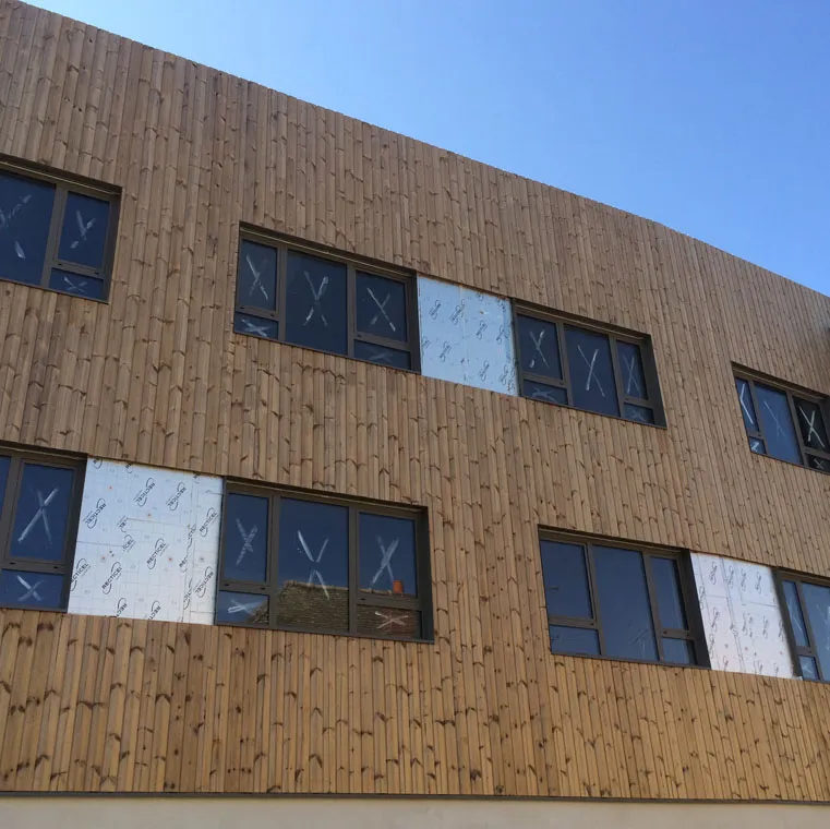 Pwerwall gevelisolatie in combinatie met een houten gevelbekleding