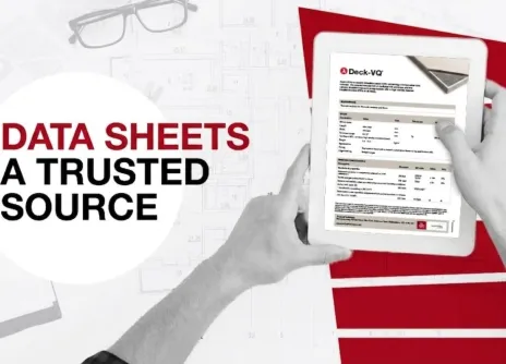 Tablet held in hands showing a data sheet, red and white background.